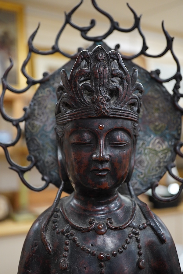 A large Chinese bronze and champleve enamel figure of a Bodhisattva, archaic style seal mark to base, 66cm